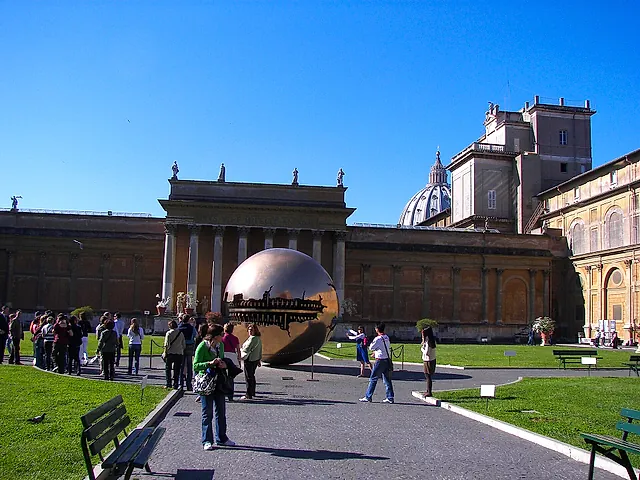 The open courtyard outside the Vatican Museums, with the pale facade of the Braccio Nuovo of the Chiaramonti Museum